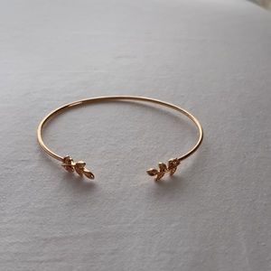 dainty cuff bracelet with leaf design